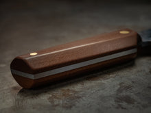 Close up of a brown handle kitchen knife showing the quality and highly functional hand made knife design