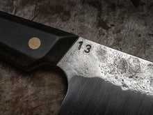 close up detail of a hand made high carbon super sharp steel blade kitchen knife hand made in collingwood australia