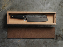handmade kitchen knife in a nice wooded storage box
