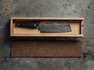 handmade kitchen knife in a nice wooded storage box