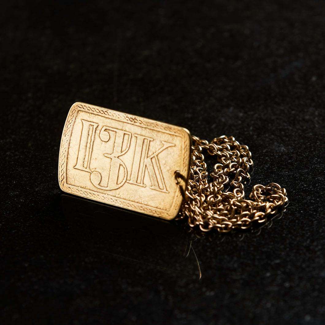 Luxury hand made brass pendant etched with 13k logo locally in collingwood melbourne australia by 13knives