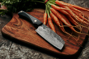 High quality hand made kitchen knife for chefs and foodies melbourne eats cooking from home chopping veggies in the kitchen like carrots for amatures and profeshional knifes hand forged in collingwood melbourne by 13knives blacksmith